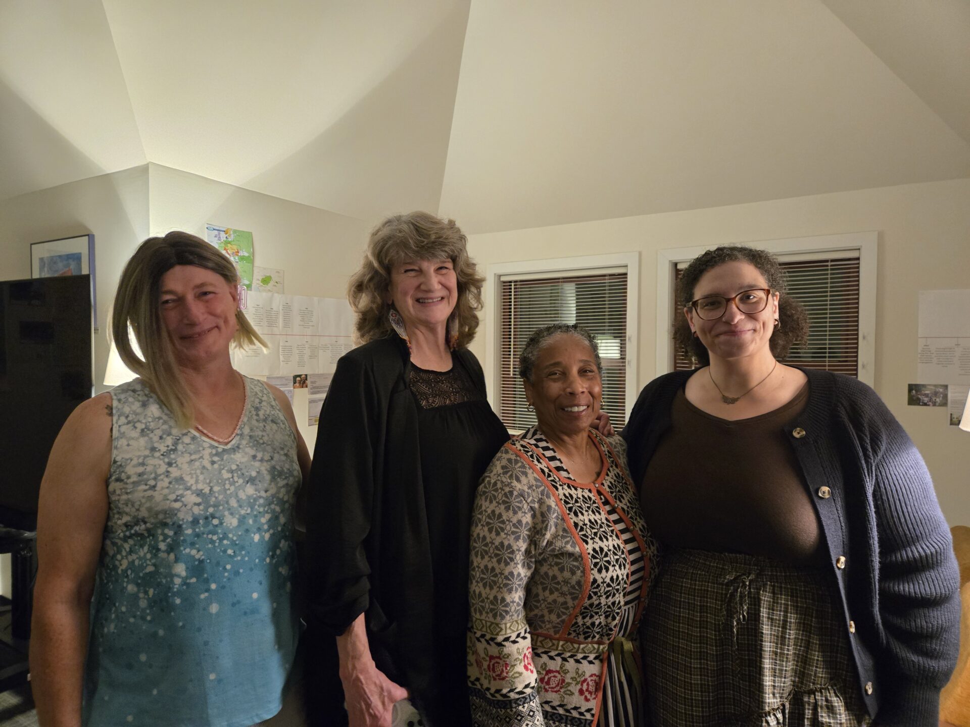 Photograph of four poets, Davi Gray, Katherine Kysar, Debra J. Stone, and Emily August.