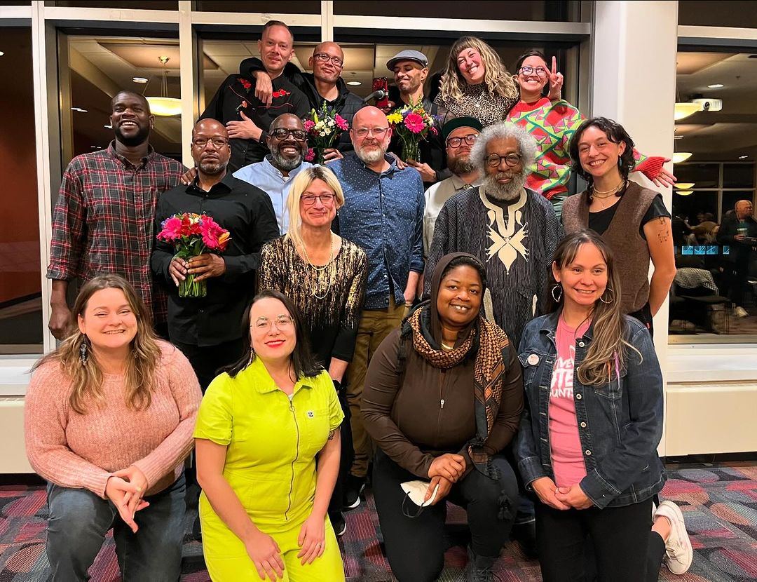 Photograph of readers at the 2024 Beyond Bars event; Davi Gray is there.